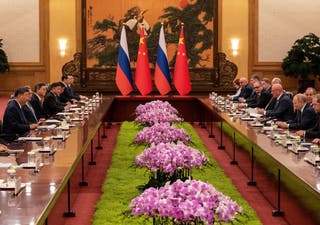 Putin and Xi seen attending a bilateral meeting at The Great Hall of the People in Beijing